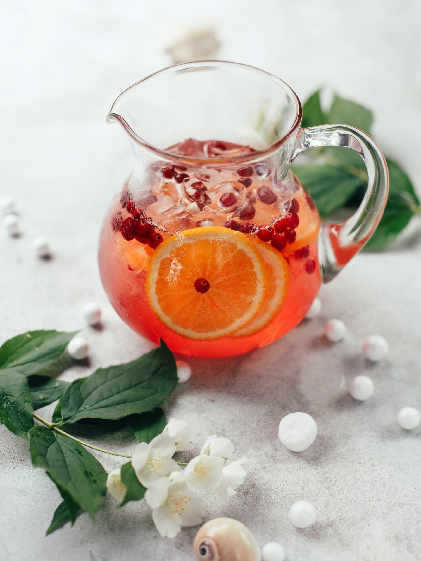 Clementine fizz served with pomegranate seeds
